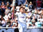 England's Ollie Pope celebrates a century during day one of the second Test between England and West Indies at Trent Bridge cricket ground(AP) England's Ollie Pope celebrates a century during day one of the second Test between England and West Indies at Trent Bridge cricket ground(AP)