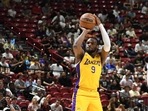 LAS VEGAS, NEVADA - JULY 17: Bronny James Jr. #9 of the Los Angeles Lakers scores on a three-point shot against the Atlanta Hawks in the first half of a 2024 NBA Summer League game at the Thomas & Mack Center on July 17, 2024 in Las Vegas, Nevada. The Lakers defeated the Hawks 87-86. LAS VEGAS, NEVADA - JULY 17: Bronny James Jr. #9 of the Los Angeles Lakers scores on a three-point shot against the Atlanta Hawks in the first half of a 2024 NBA Summer League game at the Thomas & Mack Center on July 17, 2024 in Las Vegas, Nevada. The Lakers defeated the Hawks 87-86.
