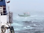 An Indian Fishing Boat (IFB) 'Aashni' after being rescued by personnel of Indian Coast Guard (ICG), with 11 crew onboard amid heavy rain (PTI Photo)(PTI) An Indian Fishing Boat (IFB) 'Aashni' after being rescued by personnel of Indian Coast Guard (ICG), with 11 crew onboard amid heavy rain (PTI Photo)(PTI)
