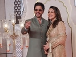 Shah Rukh Khan and his wife Gauri Khan pose for pictures on the red carpet at Anant Ambani and Radhika Merchant's wedding in Mumbai.