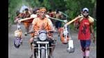 Kanwariyas seen on their way to Okhla Bird Sanctuary while coming back from Haridwar carrying water from the Ganga River, in Noida on July 28, 2019. (HT File) Kanwariyas seen on their way to Okhla Bird Sanctuary while coming back from Haridwar carrying water from the Ganga River, in Noida on July 28, 2019. (HT File)