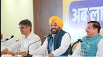 Punjab chief minister Bhagwant Mann flanked by AAP leaders Sandeep Pathak (left) and Sanjay Singh at a press conference in Chandigarh on Thursday. (PTI Photo) Punjab chief minister Bhagwant Mann flanked by AAP leaders Sandeep Pathak (left) and Sanjay Singh at a press conference in Chandigarh on Thursday. (PTI Photo)