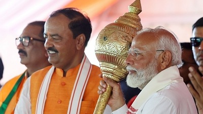Prayagraj, May 20 (ANI): Prime Minister Narendra Modi holds a mace during a public meeting for the sixth phase of Lok Sabha Polls, in Prayagraj on Tuesday. Uttar Pradesh Dy CM Keshav Prasad Maurya also present. Deputy chief minister Keshav Prasad Maurya and BJP allies Sanjay Nishad, Om Prakash Rajbhar and Anupriya Patel are believed to have indirectly targeted chief minister Yogi Adityanath (ANI Photo) (BJP) Prayagraj, May 20 (ANI): Prime Minister Narendra Modi holds a mace during a public meeting for the sixth phase of Lok Sabha Polls, in Prayagraj on Tuesday. Uttar Pradesh Dy CM Keshav Prasad Maurya also present. Deputy chief minister Keshav Prasad Maurya and BJP allies Sanjay Nishad, Om Prakash Rajbhar and Anupriya Patel are believed to have indirectly targeted chief minister Yogi Adityanath (ANI Photo) (BJP)