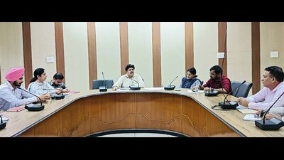 Additional deputy commissioner (G) Major Amit Sareen during a meeting with heads of various departments in Ludhiana on Thursday. (HT Photo)