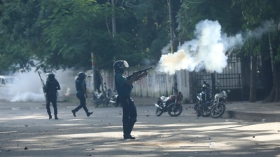 Police fire tear gas shells and rubber bullets to disperse students shouting slogans in favor of quota system in public service at the university campus, in Dhaka, Bangladesh, Wednesday, July 17, 2024. (AP) Police fire tear gas shells and rubber bullets to disperse students shouting slogans in favor of quota system in public service at the university campus, in Dhaka, Bangladesh, Wednesday, July 17, 2024. (AP)
