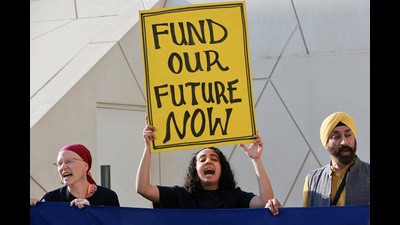 FILE PHOTO: Climate activists protest against fossil fuel emitters, demanding action and more contributions to the Loss and Damage Fund, during COP28 in Dubai, United Arab Emirates, December 4, 2023. REUTERS/Thaier Al Sudani/File Photo (REUTERS)