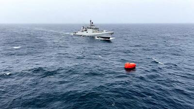 Indian Navy warship INS Teg carrying out a rescue operation after an oil tanker, MT Falcon Prestige, capsized off the coast of Oman. (PTI Photo)