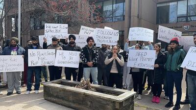 Students from India protesting curbs on pathways to permanent resident status this May in the province of Prince Edward Island, Canada. (Credit: Montreal Youth Student Organisation) Students from India protesting curbs on pathways to permanent resident status this May in the province of Prince Edward Island, Canada. (Credit: Montreal Youth Student Organisation)
