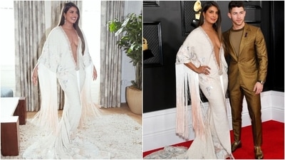 Priyanka embraced risqué fashion for the 62nd Grammy Awards in a dramatic Ralph & Russo gown. The vintage-inspired number featured a super-plunging beaded neckline, a front slit, an embroidered train, and ombré fringe adorned on the kaftan-style sleeves. (Instagram) Priyanka embraced risqué fashion for the 62nd Grammy Awards in a dramatic Ralph & Russo gown. The vintage-inspired number featured a super-plunging beaded neckline, a front slit, an embroidered train, and ombré fringe adorned on the kaftan-style sleeves. (Instagram)