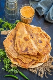 Masala paratha is a crunchy delight! (Pinterest) Masala paratha is a crunchy delight! (Pinterest)