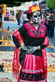 People wear traditional dresses, and flowery headgear and paint their faces. (Pexels) People wear traditional dresses, and flowery headgear and paint their faces. (Pexels)