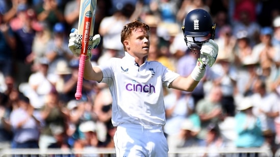 England's Ollie Pope celebrates a century during day one of the second Test between England and West Indies at Trent Bridge cricket ground(AP)