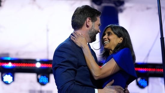 Republican vice presidential candidate Sen. JD Vance, R-Ohio, hugs his wife Usha Chilukuri Vance after speaking on third day of the Republican National Convention at the Fiserv Forum, Wednesday, July 17, 2024, in Milwaukee. (AP Photo/Evan Vucci)(AP)