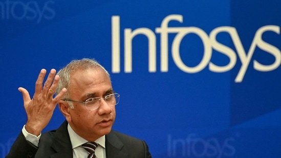 Salil Parekh, CEO and Managing Director of Infosys, gestures while addressing a press conference held to announce the company's first quarter results in Bengaluru.(AFP)