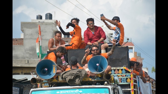 Kanwariyas arriving from Haridwar during the Kanwar Yatra, at NH 58 Meerut road, in Ghaziabad, India, onJuly 29, 2019. (HT File)