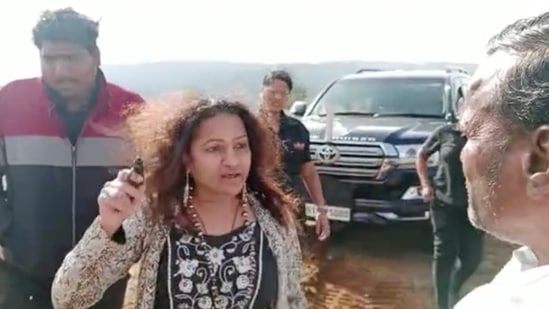 Probationary IAS officer Puja Khedkar's mother, Manorama Khedkar, has been arrested in connection with a viral video in which she is seen brandishing a gun and threatening some people, reportedly over a land dispute. 