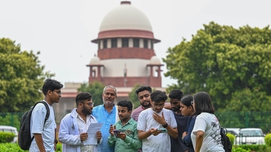 NEET aspirants assemble within the precinct of the Supreme Court of India during a hearing upon the NEET Paper leak case in New Delhi. (Hindustan Times)