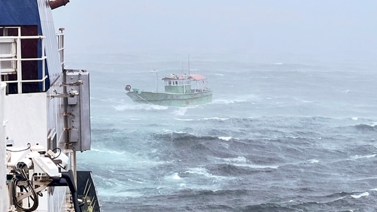 An Indian Fishing Boat (IFB) 'Aashni' after being rescued by personnel of Indian Coast Guard (ICG), with 11 crew onboard amid heavy rain (PTI Photo)(PTI)