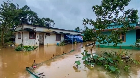 A flooded locality of Thalappuzha following a heavy downpour, in Wayanad, Thursday(PTI)