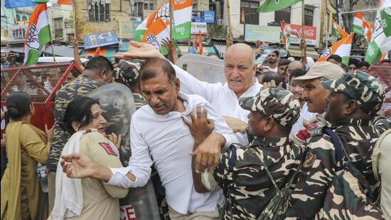 Police stop Congress workers during a protest rally against terrorism, in Jammu. (PTI)