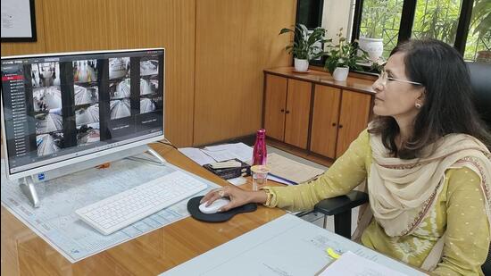 Pune divisional railway manager (DRM) Indu Dubey monitors the cameras from her office. (HT PHOTO)