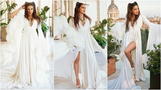 Another Bulgari event, another slay! In this white gown, Priyanka transformed into a gree goddess with a funky twist. She wore the flowy ensemble with a centre-parted pigtails hairdo, emerald jewels, and striking makeup.&nbsp;(Instagram)