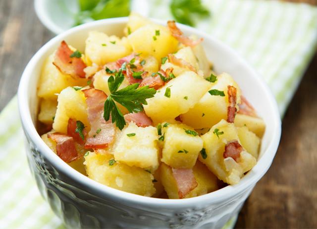 Toss diced and boiled potatoes with with sausages for a German-style salad. (ADOBE STOCK) Toss diced and boiled potatoes with with sausages for a German-style salad. (ADOBE STOCK)