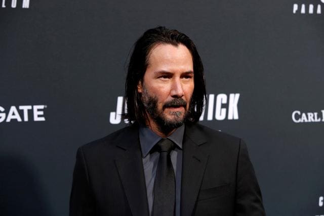 “In its shadowy underworld of hitmen, gangsters, arms dealers and homeless spies, Wick is a mythopoeic figure. He is played with such exquisite cool by Keanu Reeves, he has become a yardstick for it in our cultural lexicon. “ (Shutterstock)