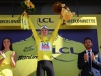 Slovenian rider Tadej Pogacar celebrates on the podium.(AFP) Slovenian rider Tadej Pogacar celebrates on the podium.(AFP)