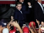 Barron Trump raises a clenched fist after he is introduced by his father, Republican presidential candidate former President Donald Trump, at a campaign rally in Doral, Fla., July 9, 2024. (AP Photo/Marta Lavandier) Barron Trump raises a clenched fist after he is introduced by his father, Republican presidential candidate former President Donald Trump, at a campaign rally in Doral, Fla., July 9, 2024. (AP Photo/Marta Lavandier)