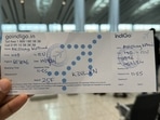 The handwritten boarding pass that a flyer got while travelling via IndiGo amid the Windows outage. (X/@akothari) The handwritten boarding pass that a flyer got while travelling via IndiGo amid the Windows outage. (X/@akothari)