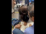 The doctor can be seen giving the man CPR. (X/@Rishi Bagree)