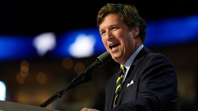 Tucker Carlson speaks during the final day of the Republican National Convention Thursday, July 18, 2024, in Milwaukee. (AP Photo/Paul Sancya) (AP) Tucker Carlson speaks during the final day of the Republican National Convention Thursday, July 18, 2024, in Milwaukee. (AP Photo/Paul Sancya) (AP)