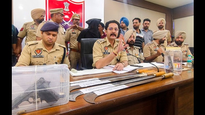 Patiala SSP Varun Sharma addresses a press conference regarding the recent arrests of various gangsters in Punjab, in Patiala, (PTI) Patiala SSP Varun Sharma addresses a press conference regarding the recent arrests of various gangsters in Punjab, in Patiala, (PTI)