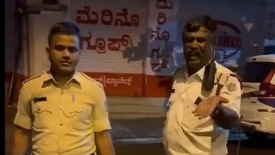 One official is from the Bengaluru Traffic Police, while the other is from the Law and Order Department, a report said. (X) One official is from the Bengaluru Traffic Police, while the other is from the Law and Order Department, a report said. (X)