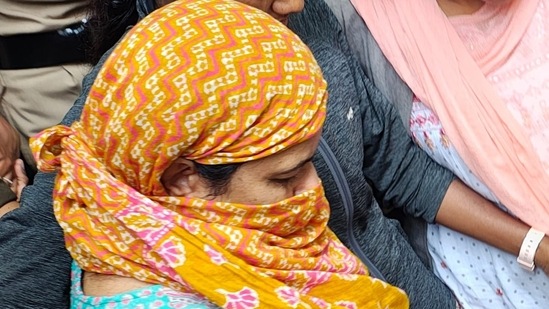 Manorama Khedkar being brought to Paud Police station. (Mahendra Kolhe/HT Photo)