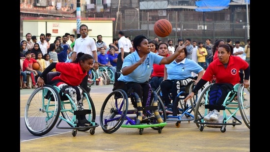 Playing to win: Mumbai Women and Pune Women teams in action during the Wheelchair Basketball Premier League at Mastan YMCA Ground, in Mumbai on March 12, 2022. (Bhushan Koyande/ HT Photo)