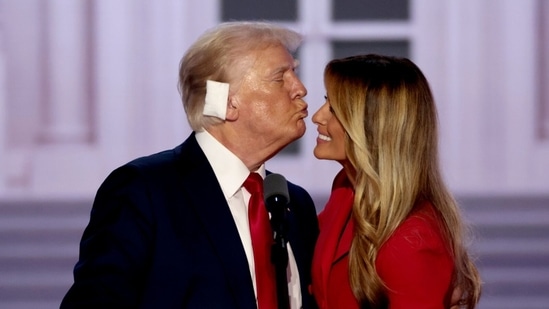 Former US President Donald Trump, left, and former First Lady Melania Trump during the Republican National Convention (RNC) at the Fiserv Forum in Milwaukee, Wisconsin, US, on Thursday, July 18, 2024. Donald Trump, who accepted his party's presidential nomination, delivered his first public address since surviving a failed assassination attempt, relating an incident in detail that he called "too painful to tell." Photographer: Hannah Beier/Bloomberg(Bloomberg)