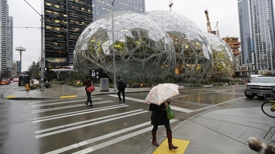 The Amazon Spheres, a few steps away from the office tower where Jeff Bezos leads the retail behemoth is part of the company’s urban campus of unmarked office buildings where more than 40,000 people report to work. (Ted S. Warren/AP)