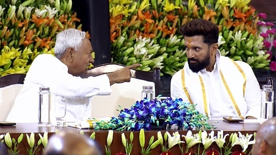 Bihar chief minister and JD(U) president Nitish Kumar in conversation with Lok Janshakti Party (Ram Vilas) chief Chirag Paswan during the National Democratic Alliance (NDA) Parliamentary Party meeting, at the Samvidhan Sadan.(ANI / File)