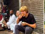 An American travel vlogger samples street food in Delhi. An American travel vlogger samples street food in Delhi.