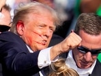 Republican presidential candidate Donald Trump reacts following an assassination attempt at a campaign event in Butler, Pennsylvania, on Saturday, July 13, 2024.(AP) Republican presidential candidate Donald Trump reacts following an assassination attempt at a campaign event in Butler, Pennsylvania, on Saturday, July 13, 2024.(AP)