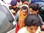 Manorama Khedkar, mother of IAS probationer Puja Khedkar, being brought by the police to a hospital for medical examination after her arrest. (HT PHOTO) Manorama Khedkar, mother of IAS probationer Puja Khedkar, being brought by the police to a hospital for medical examination after her arrest. (HT PHOTO)