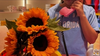 In a photo, Mira Rajput also gave a partial glimpse of her daughter, Misha Zain. The kid was seen holding a phone while wearing a blue T-shirt and white pants. In a photo, Mira Rajput also gave a partial glimpse of her daughter, Misha Zain. The kid was seen holding a phone while wearing a blue T-shirt and white pants.