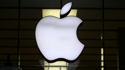 The Apple logo is illuminated at a store in the city center in Munich, Germany. (AP) The Apple logo is illuminated at a store in the city center in Munich, Germany. (AP)