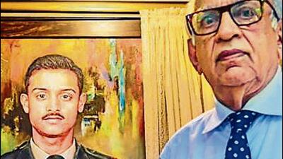 Colonel VN Thapar (right) next to a portrait of Captain Vijayant Thapar Colonel VN Thapar (right) next to a portrait of Captain Vijayant Thapar