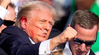 Republican presidential candidate Donald Trump reacts following an assassination attempt at a campaign event in Butler, Pennsylvania, on Saturday, July 13, 2024. (AP) Republican presidential candidate Donald Trump reacts following an assassination attempt at a campaign event in Butler, Pennsylvania, on Saturday, July 13, 2024. (AP)