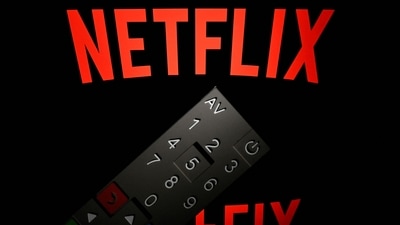 Netflix drops its basic plan of $11.99 per month for its subscribers in the US and France. (Photo by Lionel BONAVENTURE / AFP) (AFP) Netflix drops its basic plan of $11.99 per month for its subscribers in the US and France. (Photo by Lionel BONAVENTURE / AFP) (AFP)