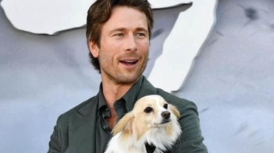 Glen Powell regularly brings his dog, Brisket, to events. Glen Powell regularly brings his dog, Brisket, to events.