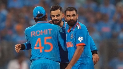 India's captain Rohit Sharma, Virat Kohli and Mohammed Shami celebrate. (PTI) India's captain Rohit Sharma, Virat Kohli and Mohammed Shami celebrate. (PTI)